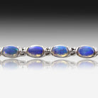 14kt White Gold Opal tennis bracelet
