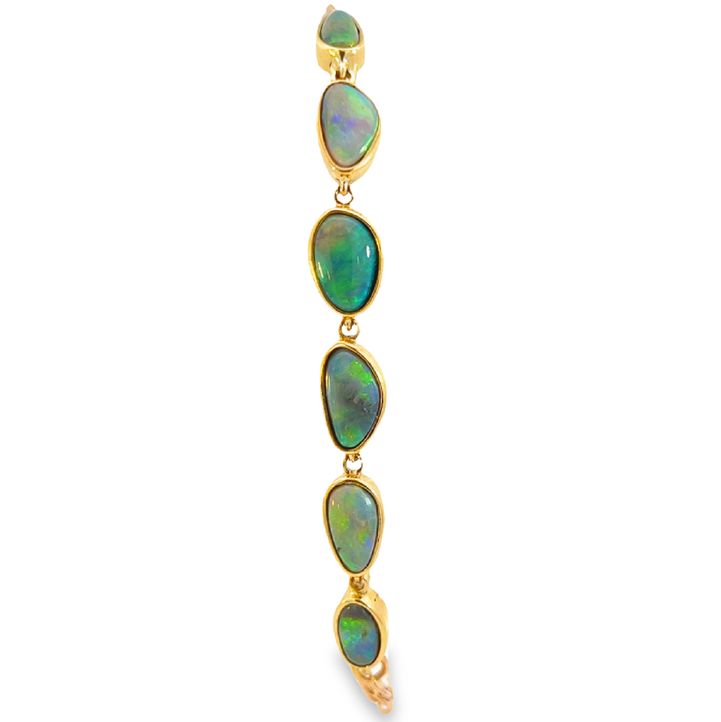 One 9kt Yellow gold bracelet with 5.32ct black Opals bezel set - Masterpiece Jewellery Opal & Gems Sydney Australia | Online Shop