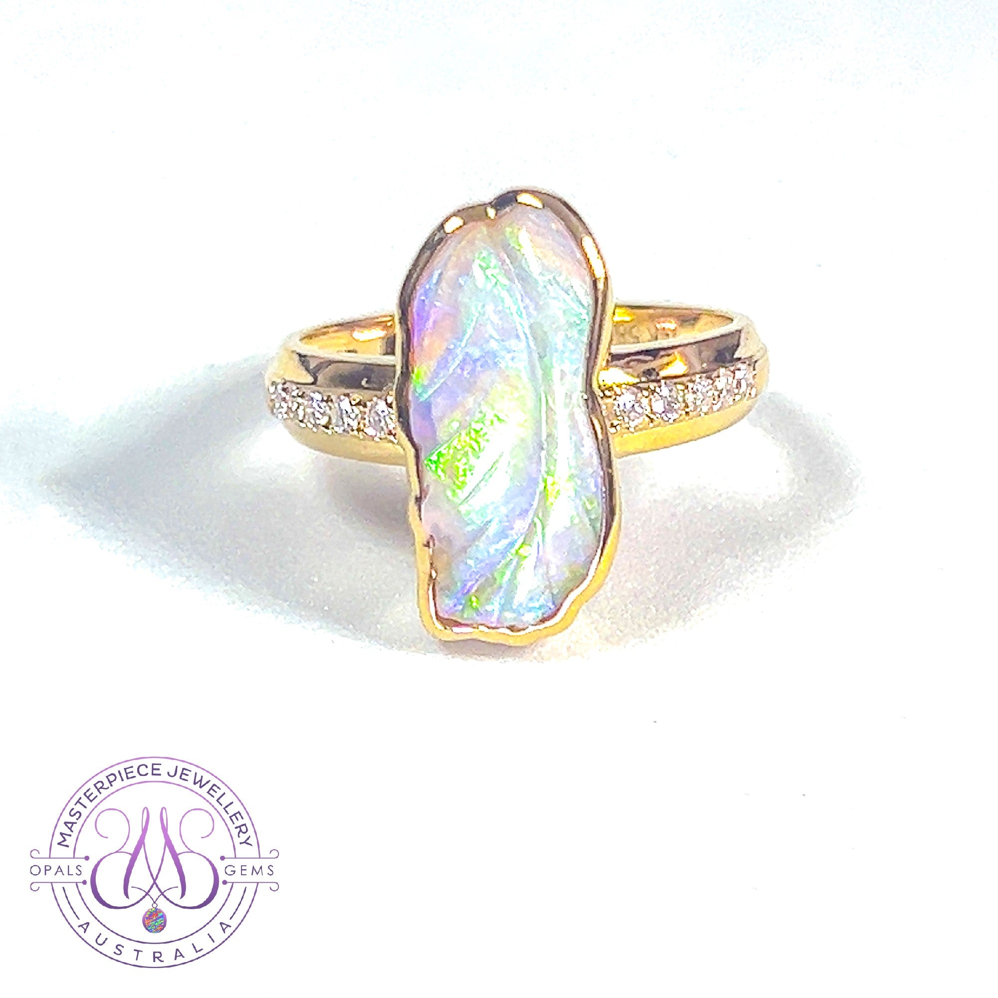 14kt Yellow Gold carved Opal 1.44ct and diamond ring