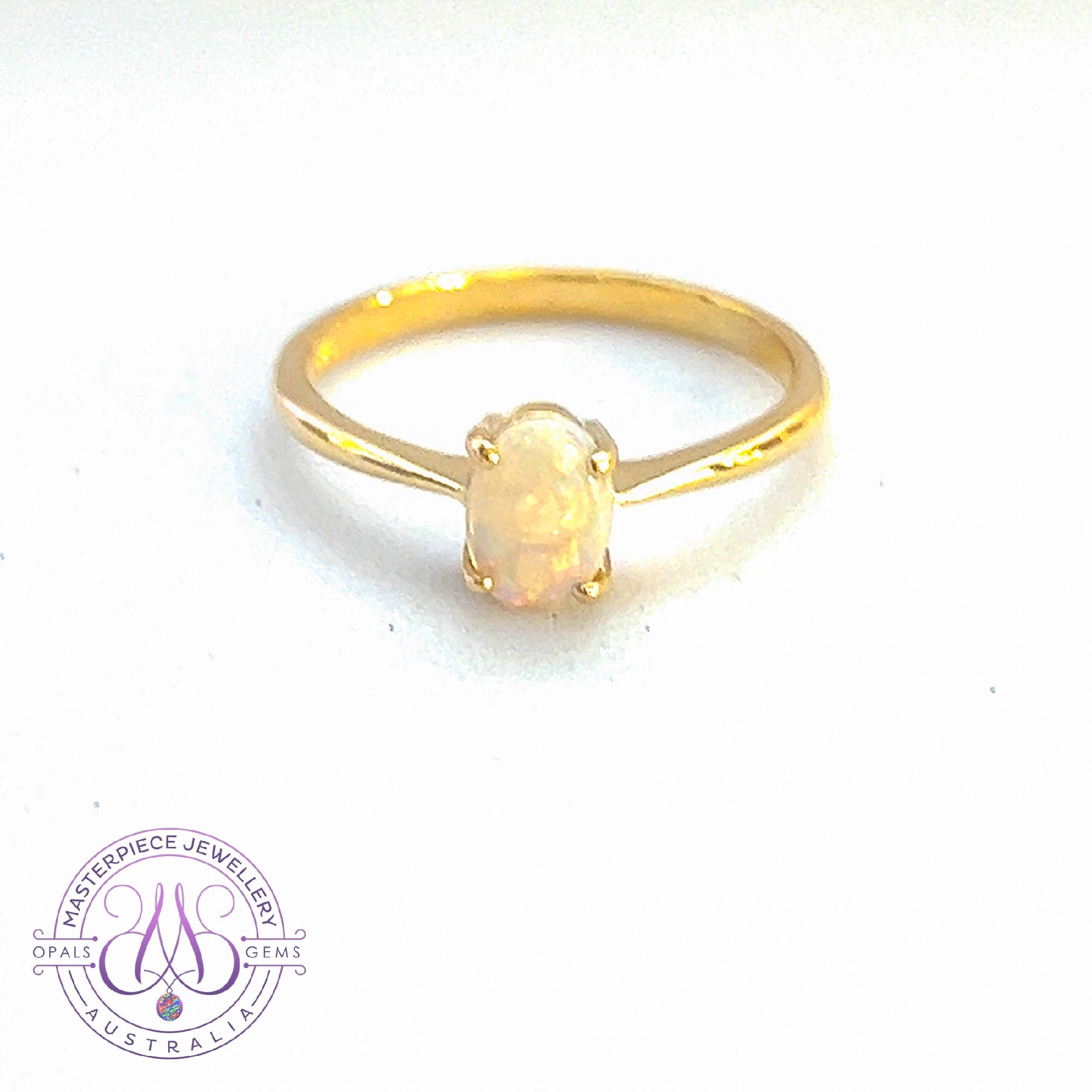 9kt Yellow Gold Crystal Opal 0.45ct claw set ring