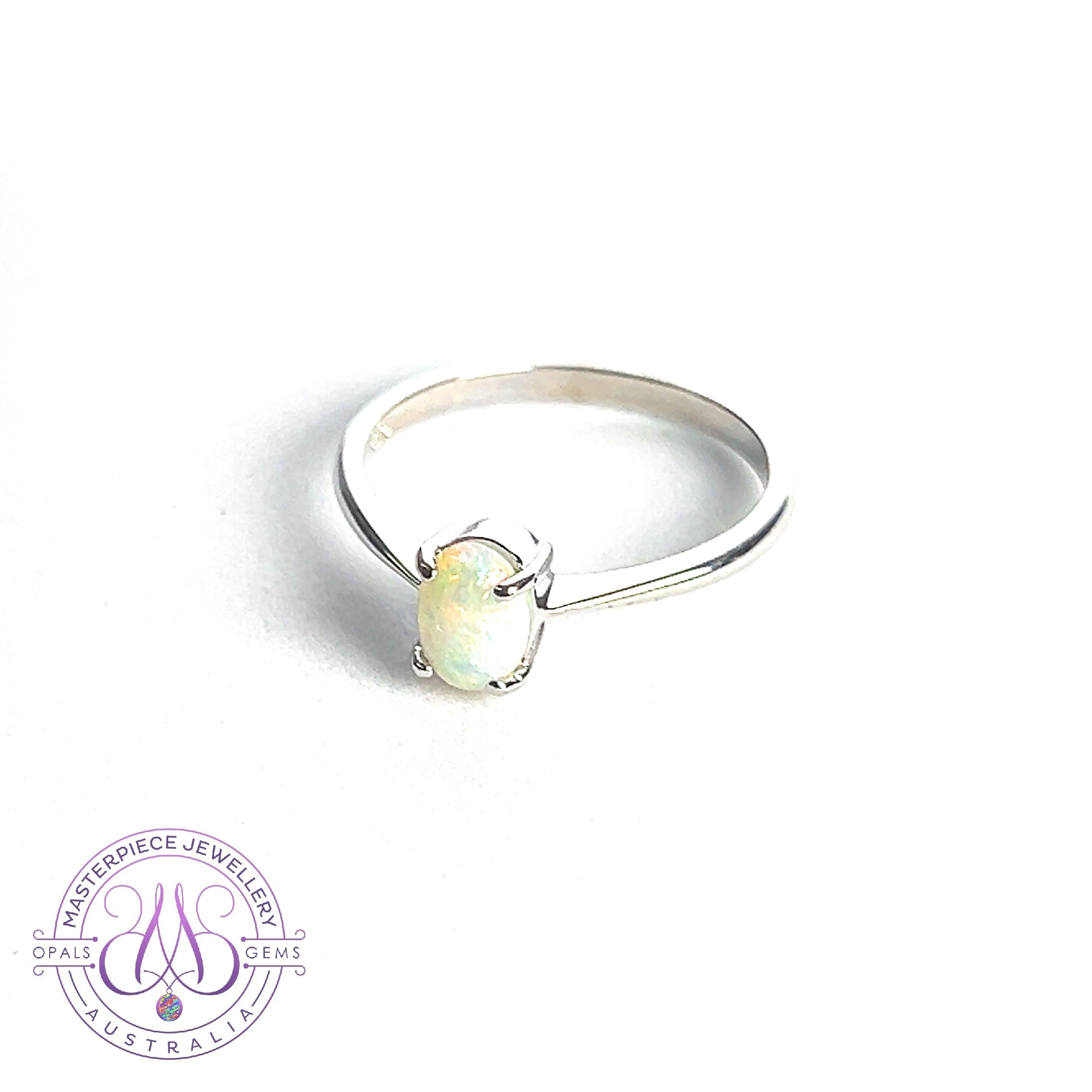 9kt White Gold solitaire White Opal 0.5ct ring