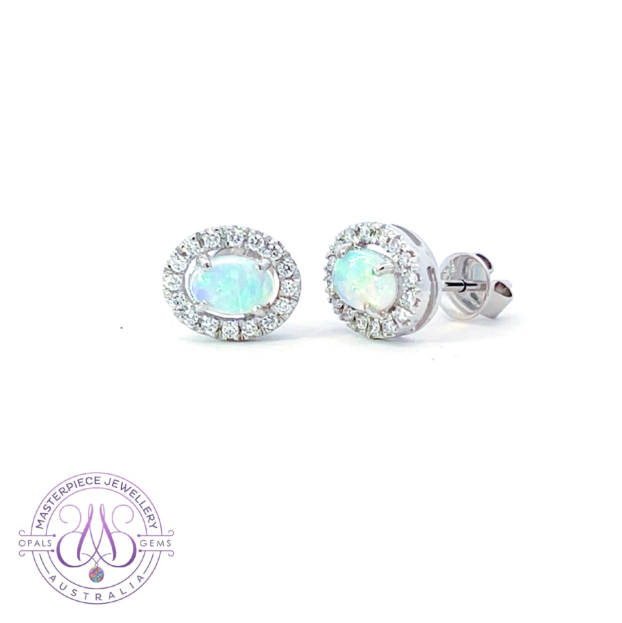 Pair of 18kt White Gold halo Opal and diamond studs 