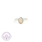 Sterling Silver cross over ring with one 7x5mm White Opal 