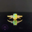 18kt Yellow Gold Crystal Opal 0.87ct and diamond ring