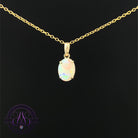 9kt Yellow Gold Black Opal Oval 1.05ct pendant