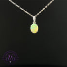 9kt White gold Black opal 0.6ct claw set pendant