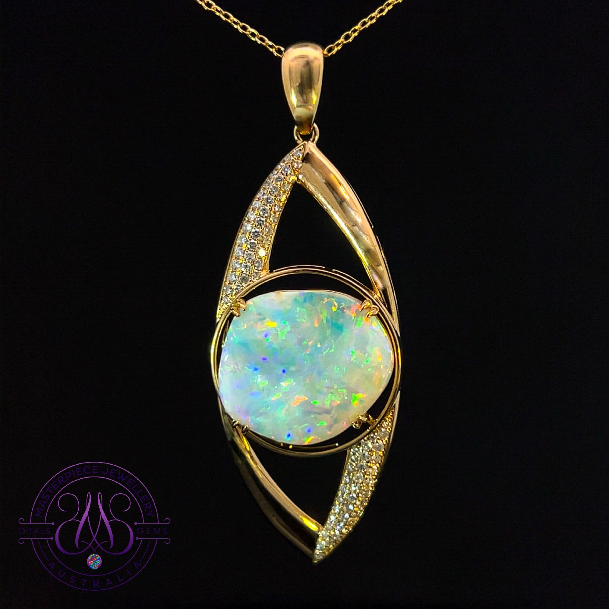 18kt Yellow Gold White Opal 6.68ct and diamond pendant