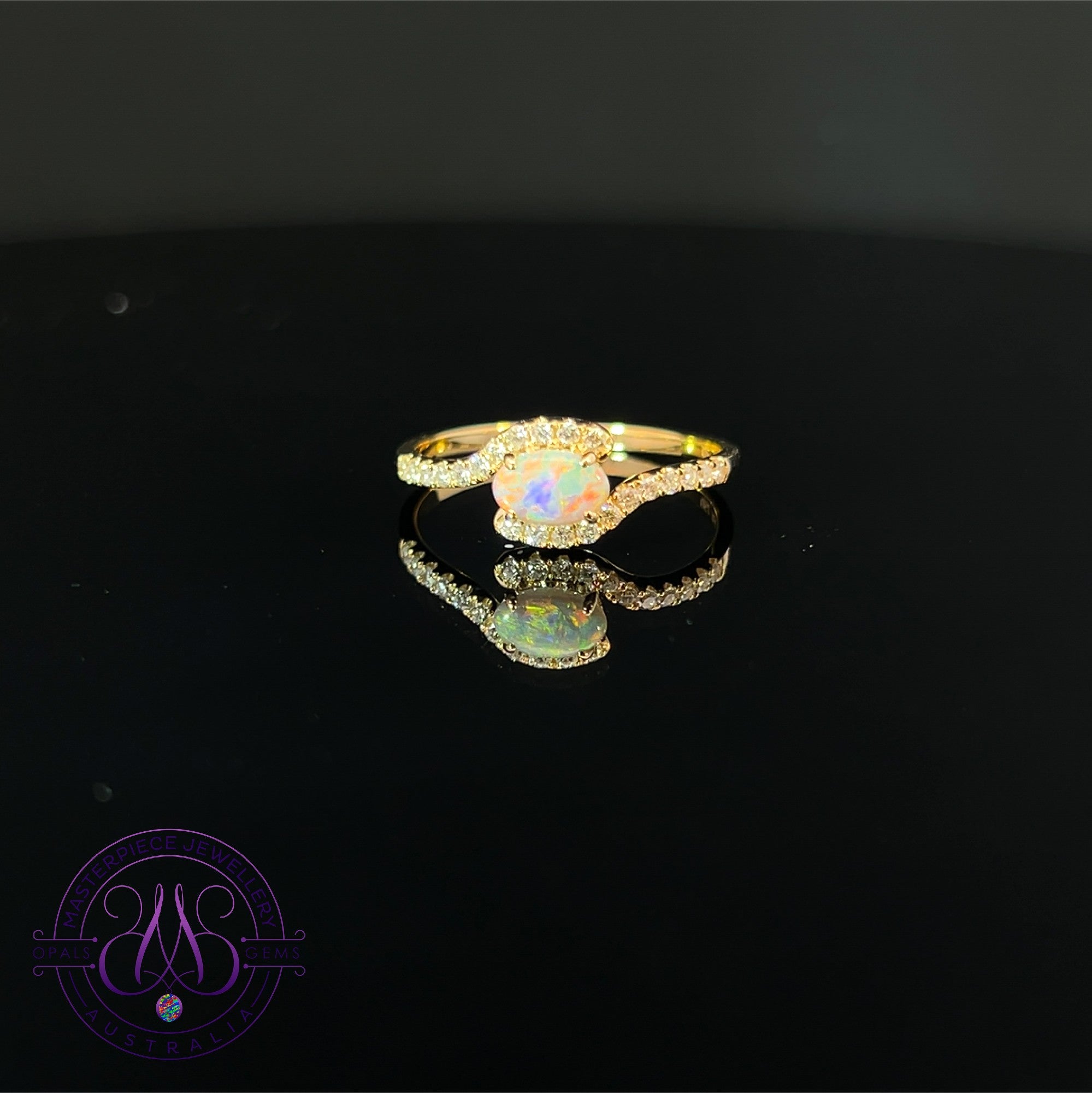 18kt Yellow Gold Black Opal 0.2 cross over diamond ring