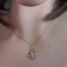 9kt yellow gold triangular crystal opal pendant and chain