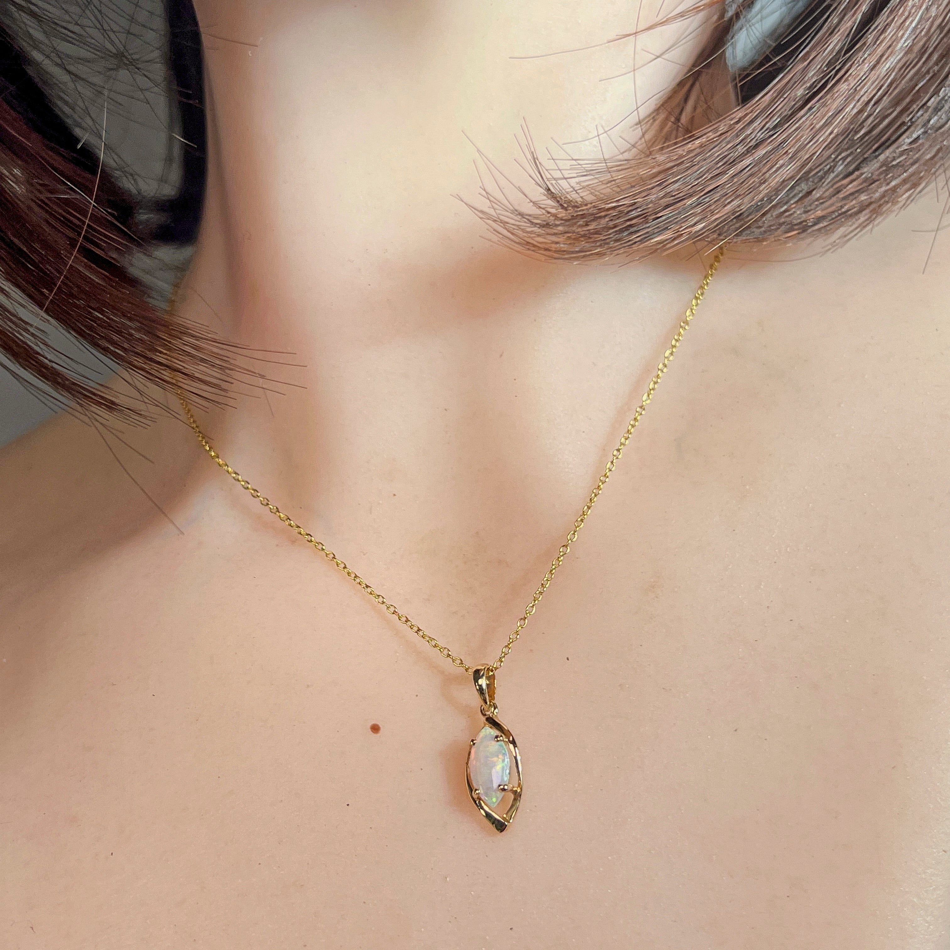 9kt yellow gold marquise crystal opal pendant, front view