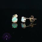9kt yellow gold claw-set stud earrings with 5.5mm round crystal opals