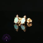 9kt yellow gold stud earrings with 6x4mm oval crystal opals and diamond accents