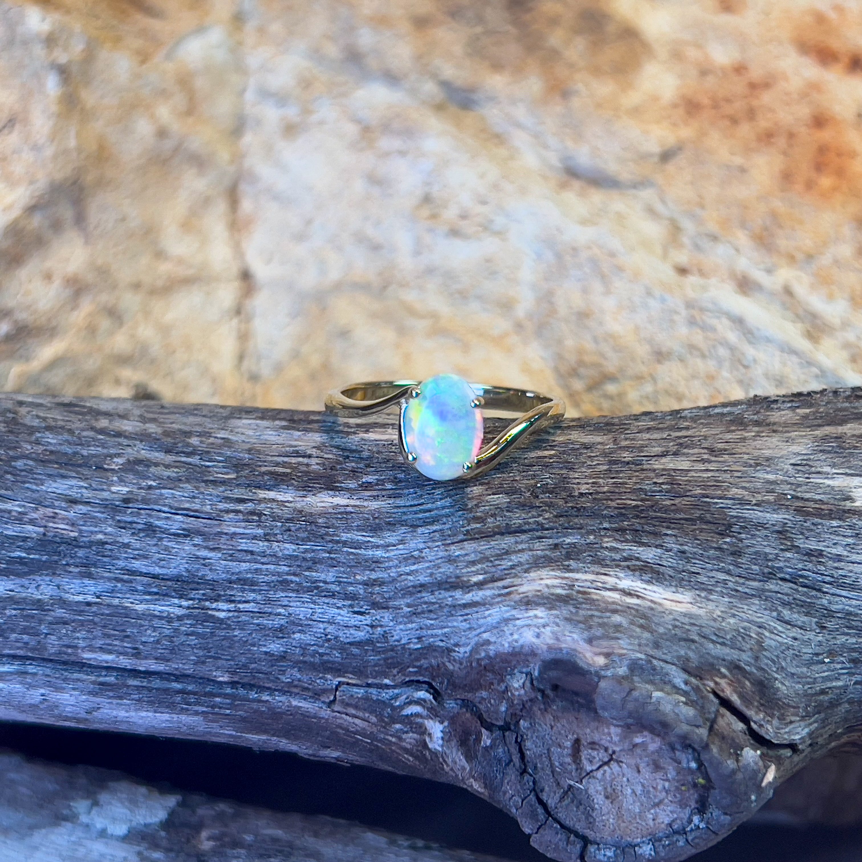 14kt Yellow Gold crossover ring with one 0.55ct Crystal Opal - Masterpiece Jewellery Opal & Gems Sydney Australia | Online Shop
