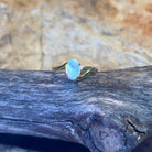 14kt Yellow Gold crossover ring with one 0.55ct Crystal Opal - Masterpiece Jewellery Opal & Gems Sydney Australia | Online Shop