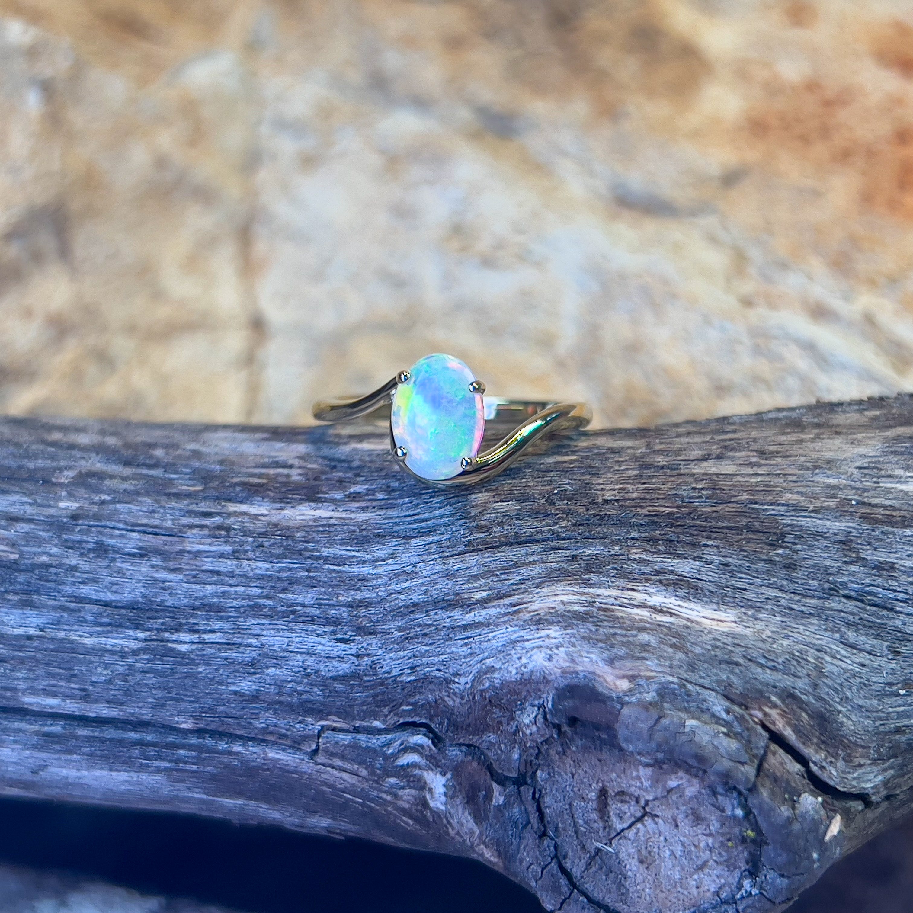 14kt Yellow Gold crossover ring with one 0.55ct Crystal Opal - Masterpiece Jewellery Opal & Gems Sydney Australia | Online Shop
