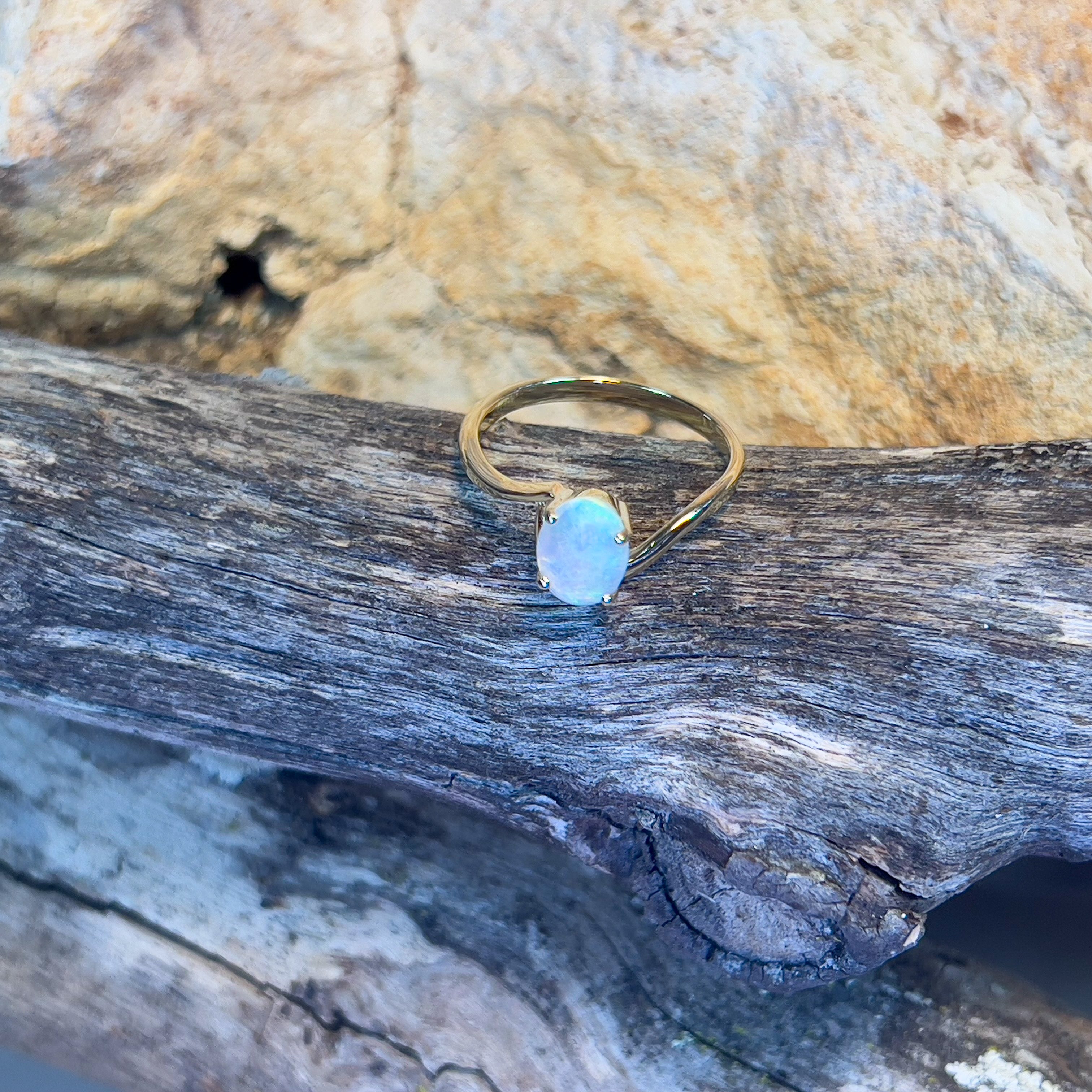 14kt Yellow Gold crossover ring with one 0.55ct Crystal Opal - Masterpiece Jewellery Opal & Gems Sydney Australia | Online Shop