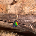 red, green and blue play-of-colour in an 11 x 8mm freeform Australian opal triplet pendant