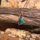 Australian opal doublet pendant, rose gold-plated silver, 12 x 6.5mm stone showing green, red and blue