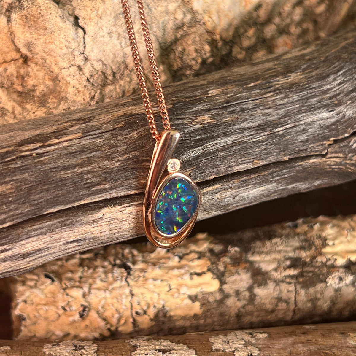 11 x 8mm Australian opal doublet pendant in rose gold-plated silver, green, red and blue