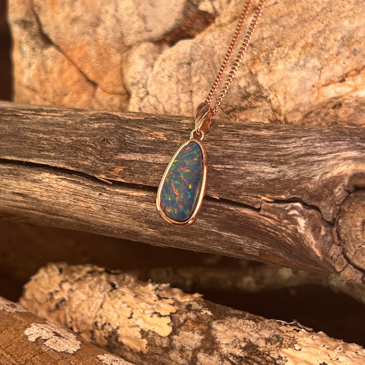 marquise Australian opal doublet pendant in rose gold-plated silver, 15 x 7.5mm, red, blue, green and violet