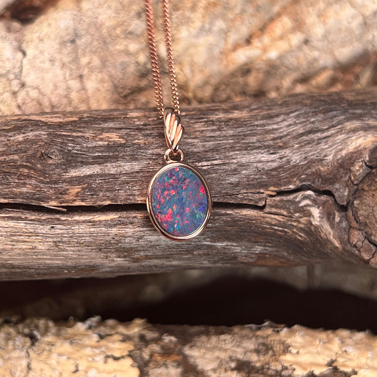 marquise Australian opal doublet pendant in rose gold-plated silver, red, blue, green and violet play-of-colour