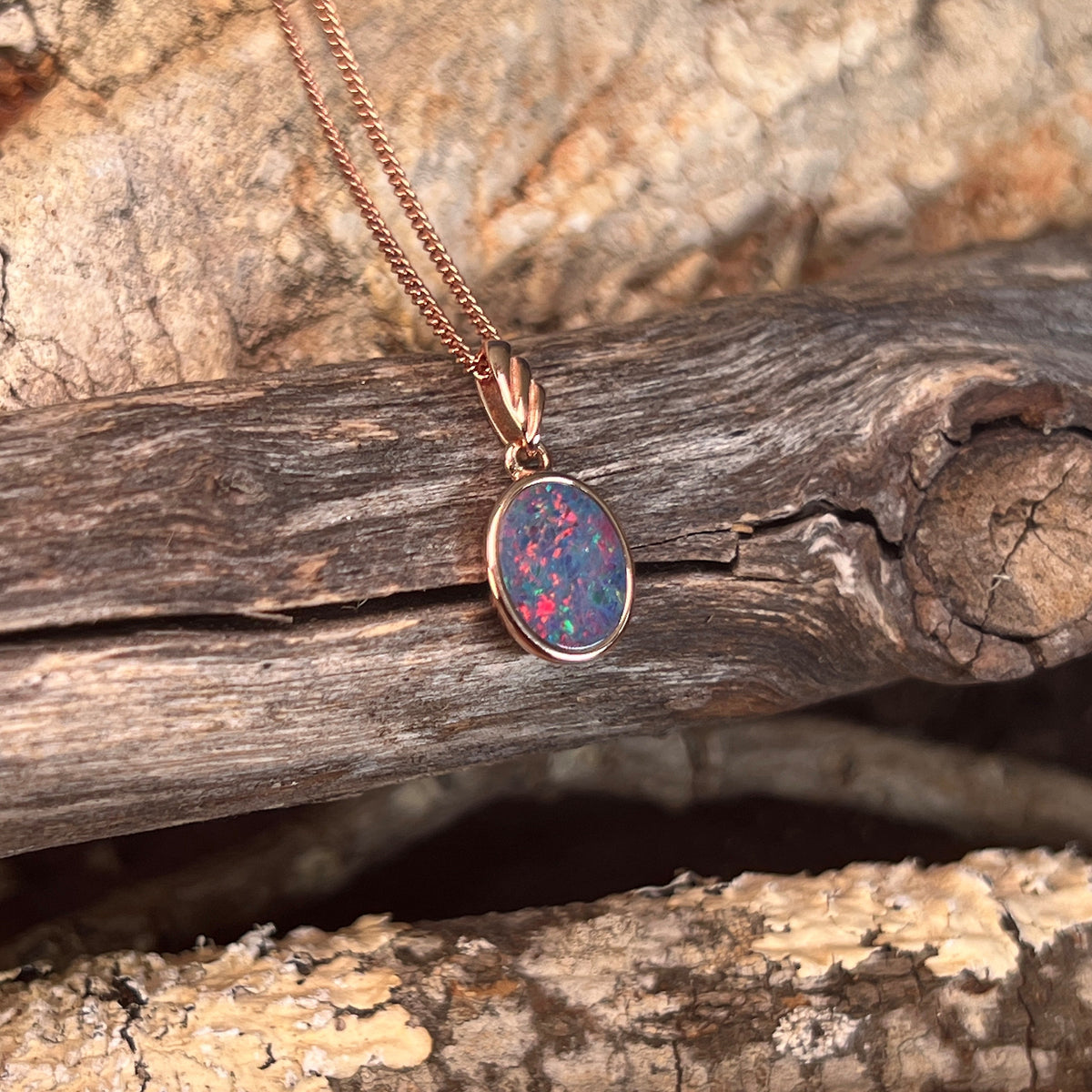 rose gold-plated silver Australian opal doublet pendant with a 15 x 7.5mm marquise stone