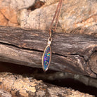 green, red, blue and yellow play-of-colour in a 16 x 5mm marquise Australian opal doublet pendant