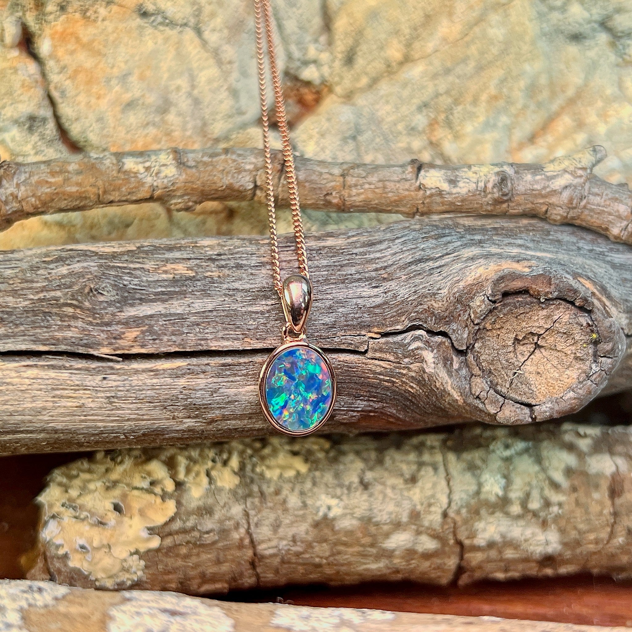rose gold-plated silver Australian opal doublet pendant with a 10 x 8mm oval stone