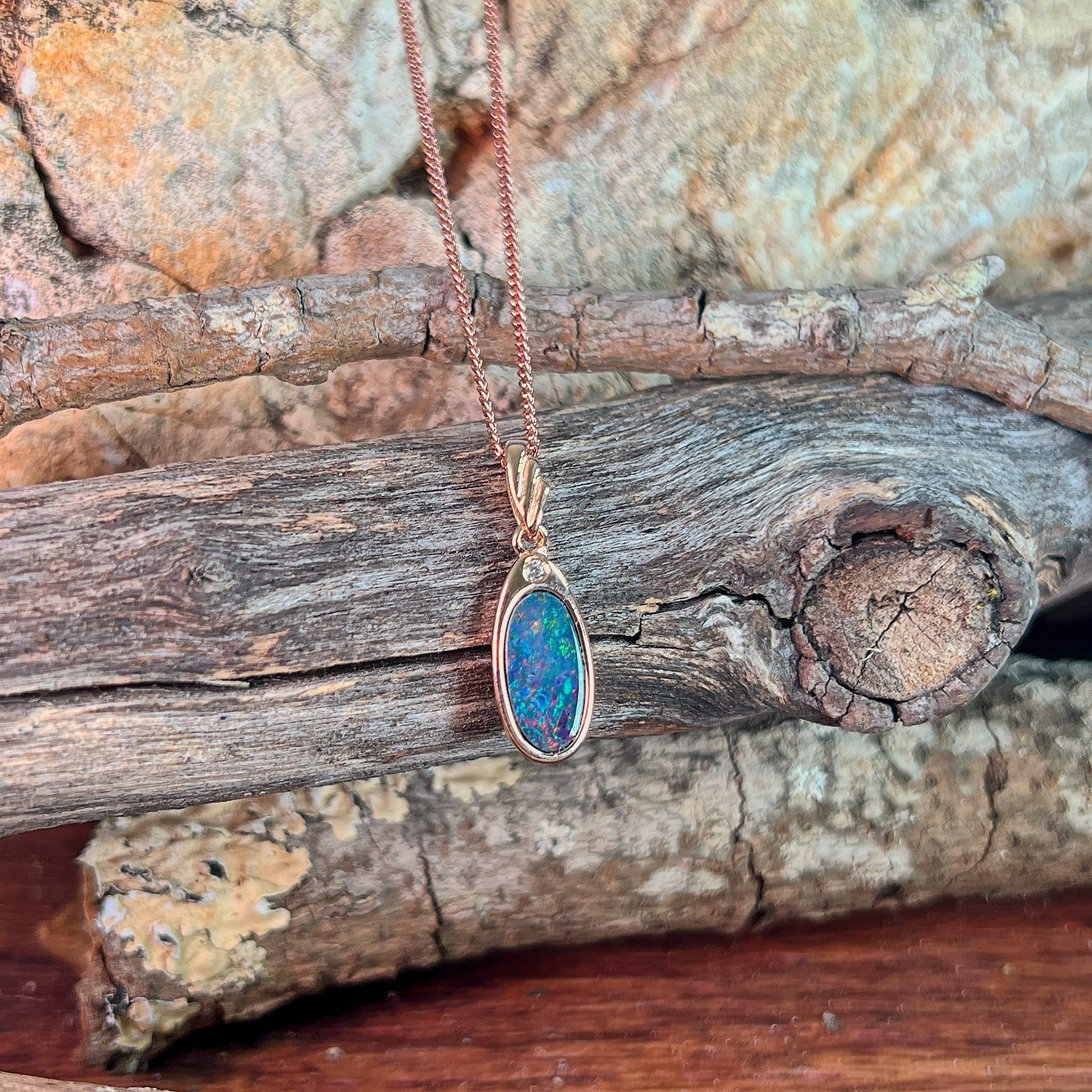 rose gold-plated silver Australian opal doublet pendant with a 12 x 6.5mm oval stone