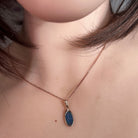 Australian opal doublet pendant worn at the neck, rose gold-plated silver, 12 x 6.5mm oval stone