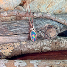 rose gold-plated silver Australian opal doublet pendant with a 13 x 7mm oval stone