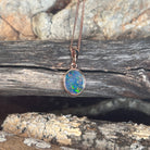 oval Australian opal doublet pendant in rose gold-plated silver, green, red, blue and yellow play-of-colour