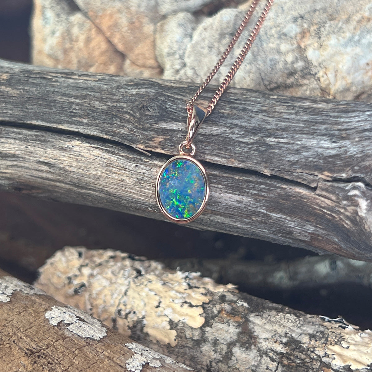 rose gold-plated silver Australian opal doublet pendant with a 10 x 8mm oval stone