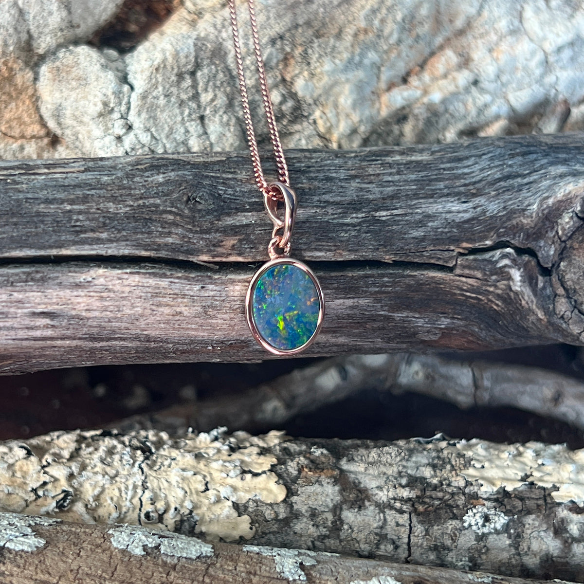 10 x 8mm Australian opal doublet pendant in rose gold-plated silver, green, red, blue and yellow