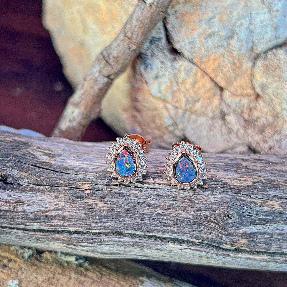 7 x 5mm Australian opal doublet earrings in rose gold-plated silver, red, blue and green