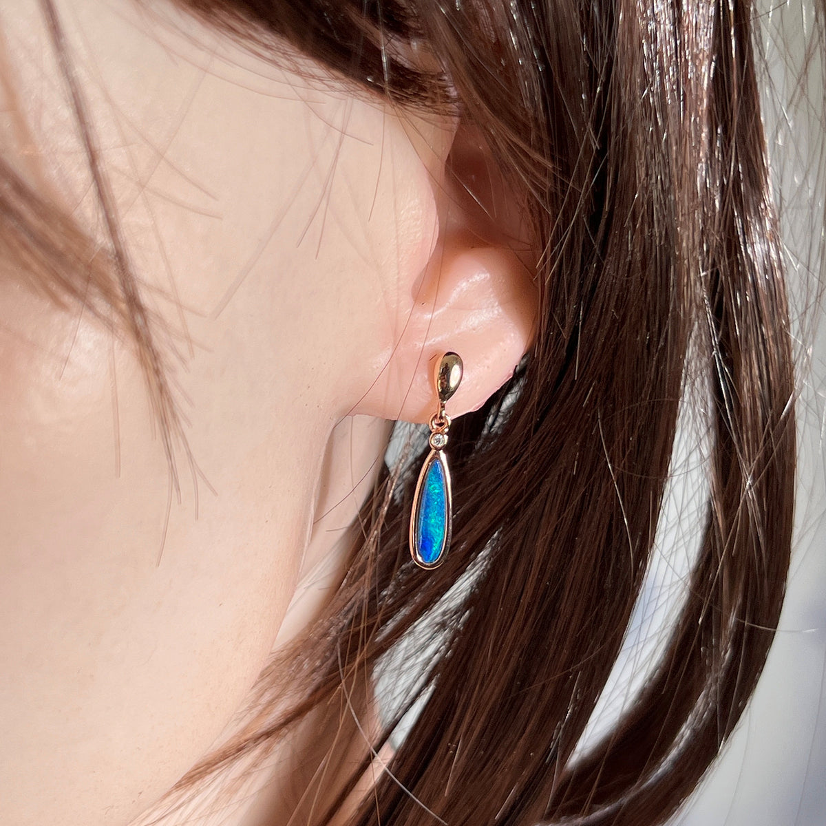 Australian opal doublet earrings worn on the ear, rose gold-plated silver, 15 x 5mm pear-shaped stones