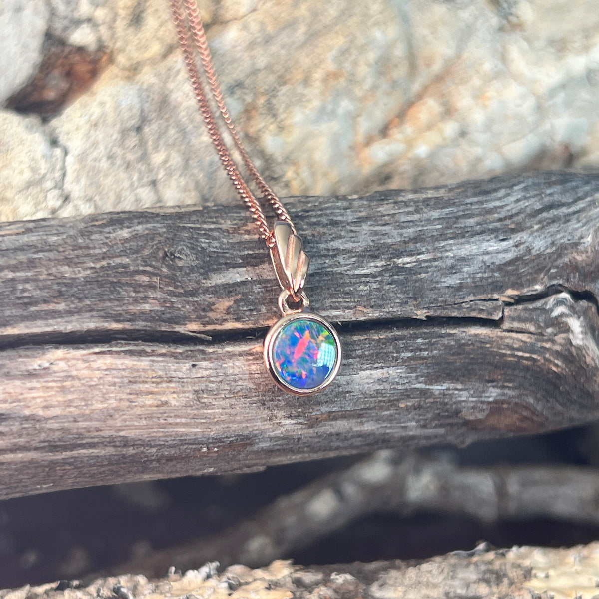 6mm Australian opal doublet pendant in rose gold-plated silver, green, red, blue and yellow