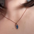 Australian opal doublet pendant worn at the neck, rose gold-plated silver, 11 x 5.5mm triangular stone