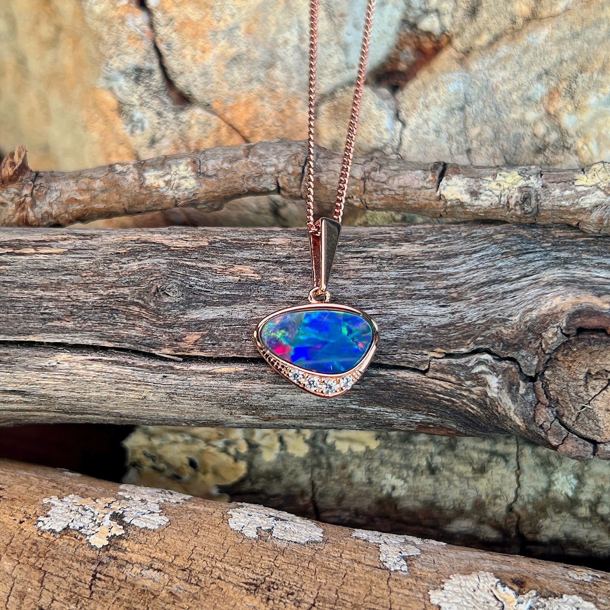 rose gold-plated silver Australian opal doublet pendant with a 13 x 7mm triangular stone