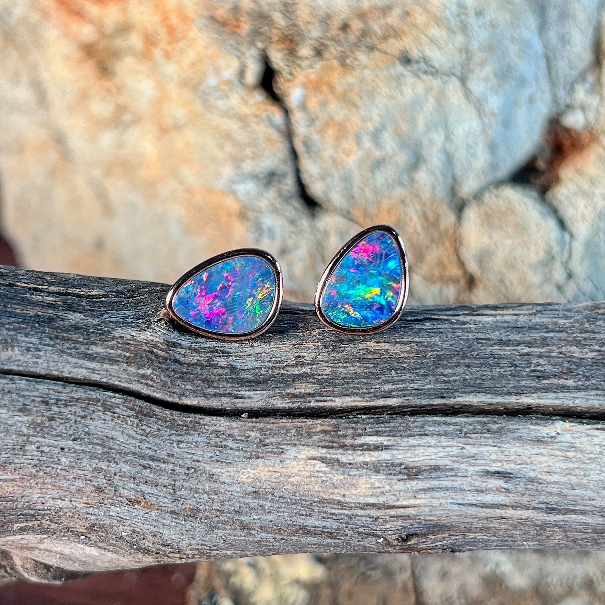 triangular Australian opal doublet earrings in rose gold-plated silver, red, blue and green play-of-colour