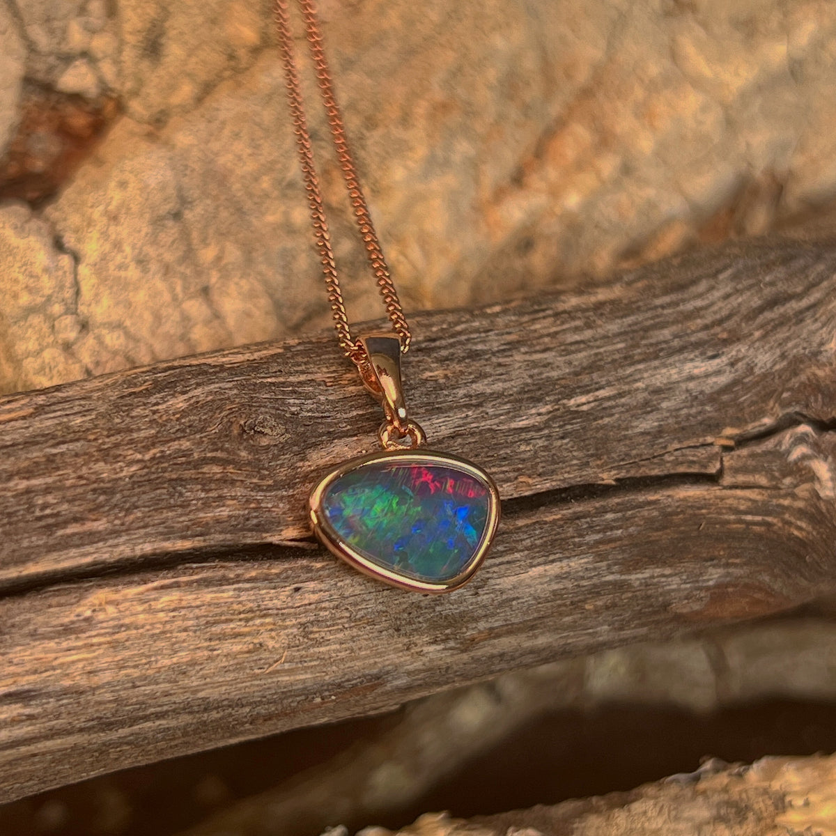 yellow gold-plated silver Australian opal triplet pendant with a 12 x 8mm freeform stone
