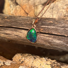red, green and blue play-of-colour in a 12 x 8mm freeform Australian opal triplet pendant