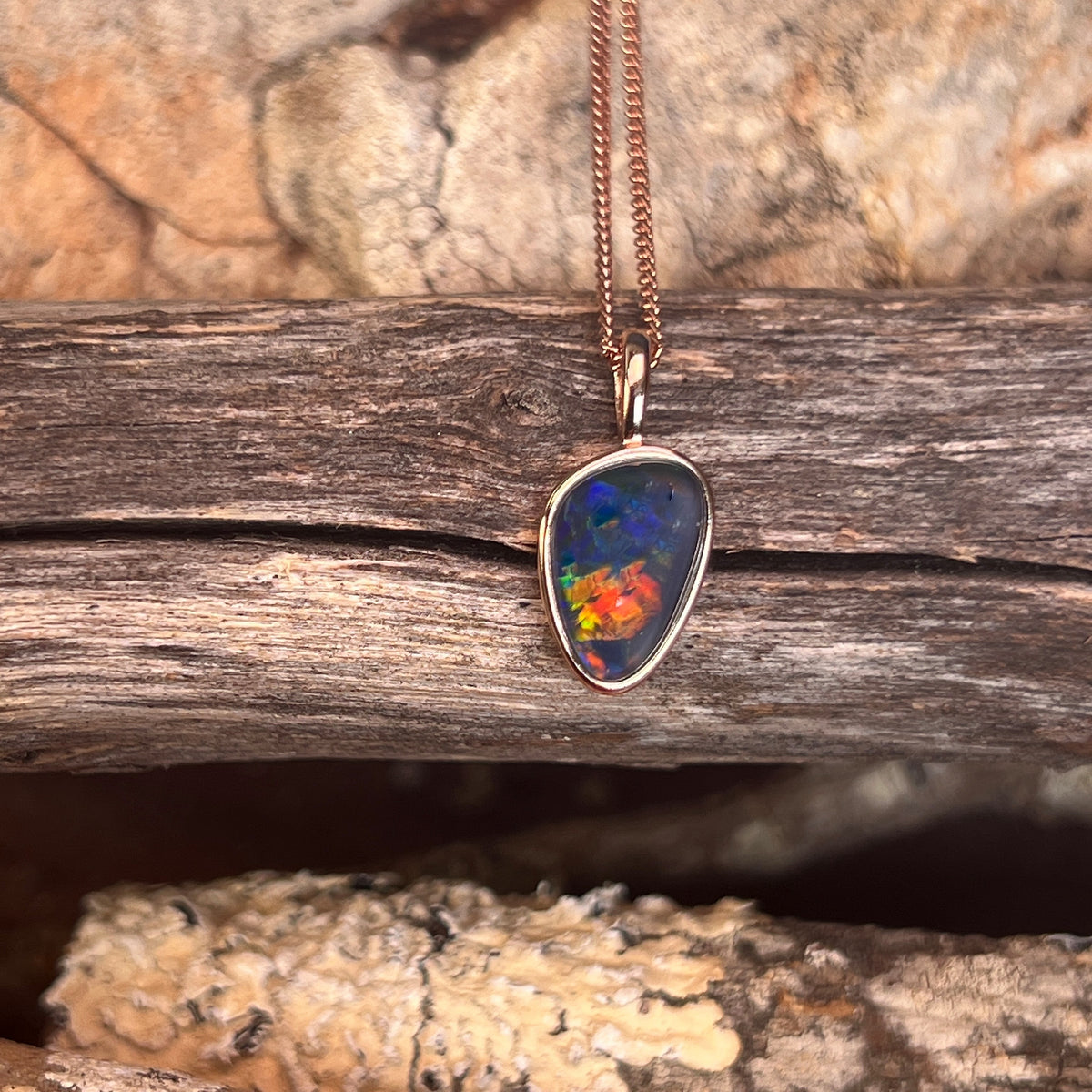 rose gold-plated silver bezel-set Australian opal triplet pendant, red, green and blue play-of-colour