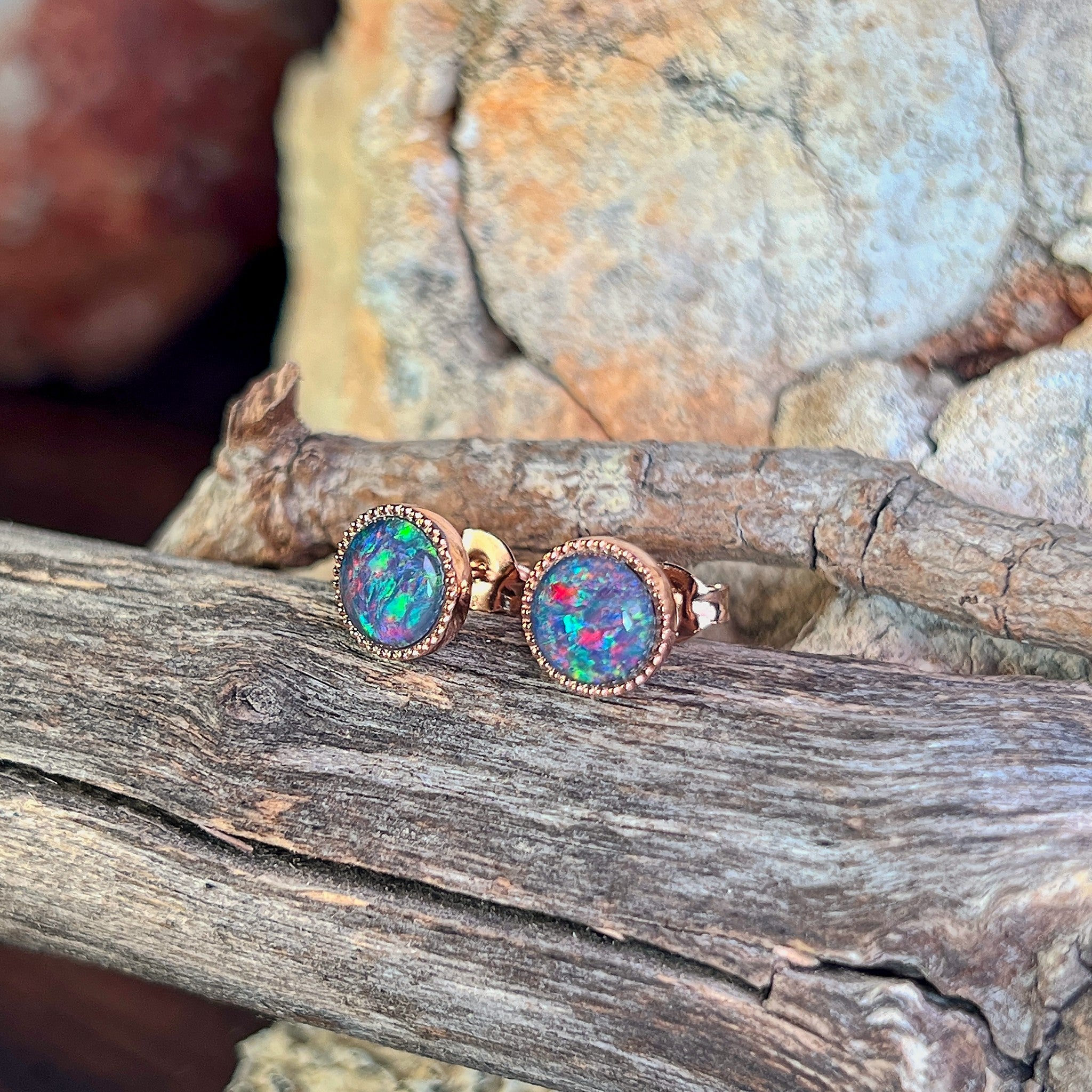 red, blue and green play-of-colour in 7mm round Australian opal triplet earrings