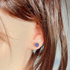 Worn Australian opal triplet earrings in rose gold-plated silver, red, blue and green, 6mm