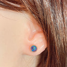 Australian opal triplet earrings worn on the ear, rose gold-plated silver, 6mm round stones