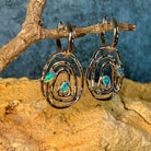 Concentric circle sterling silver earrings with Australian opal detail