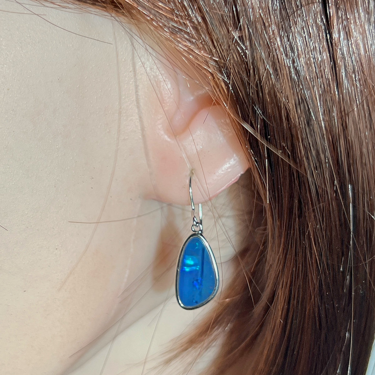 17.5 x 9mm freeform Australian opal doublet earrings worn on the ear, sterling silver