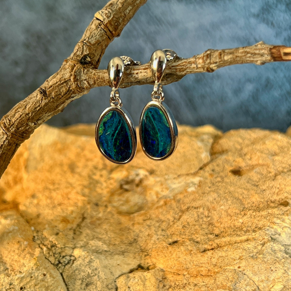 red, pink, blue and green play-of-colour in 12 x 8mm freeform Australian opal doublet earrings