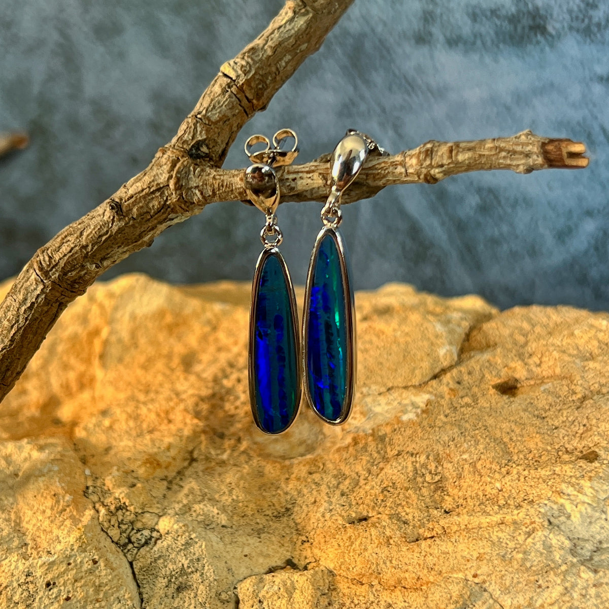 green and blue play-of-colour in 23 x 6mm freeform Australian opal doublet earrings